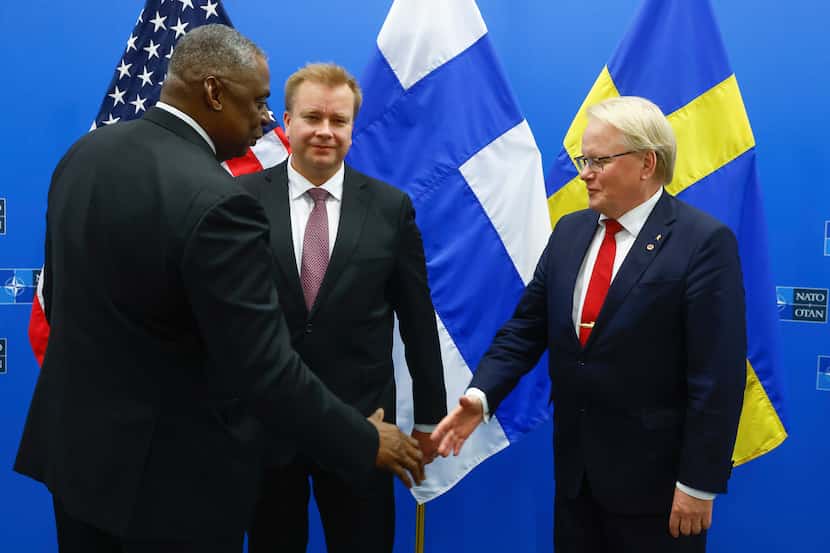 U.S. Secretary for Defense Lloyd J. Austin III (left) greets Finland's Defense Minister...
