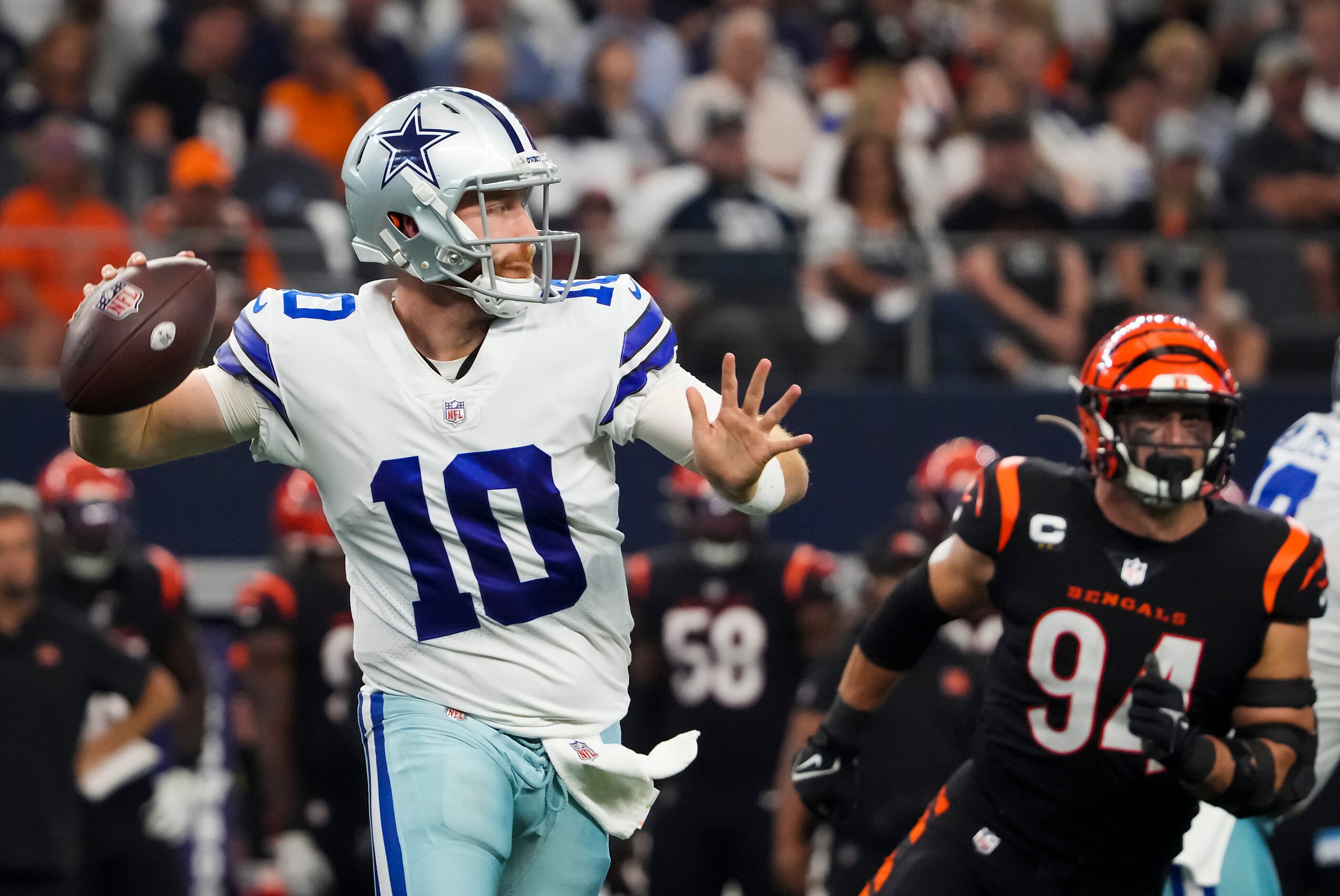 Dallas Cowboys quarterback Cooper Rush (10) throws a pass as Cincinnati Bengals defensive...