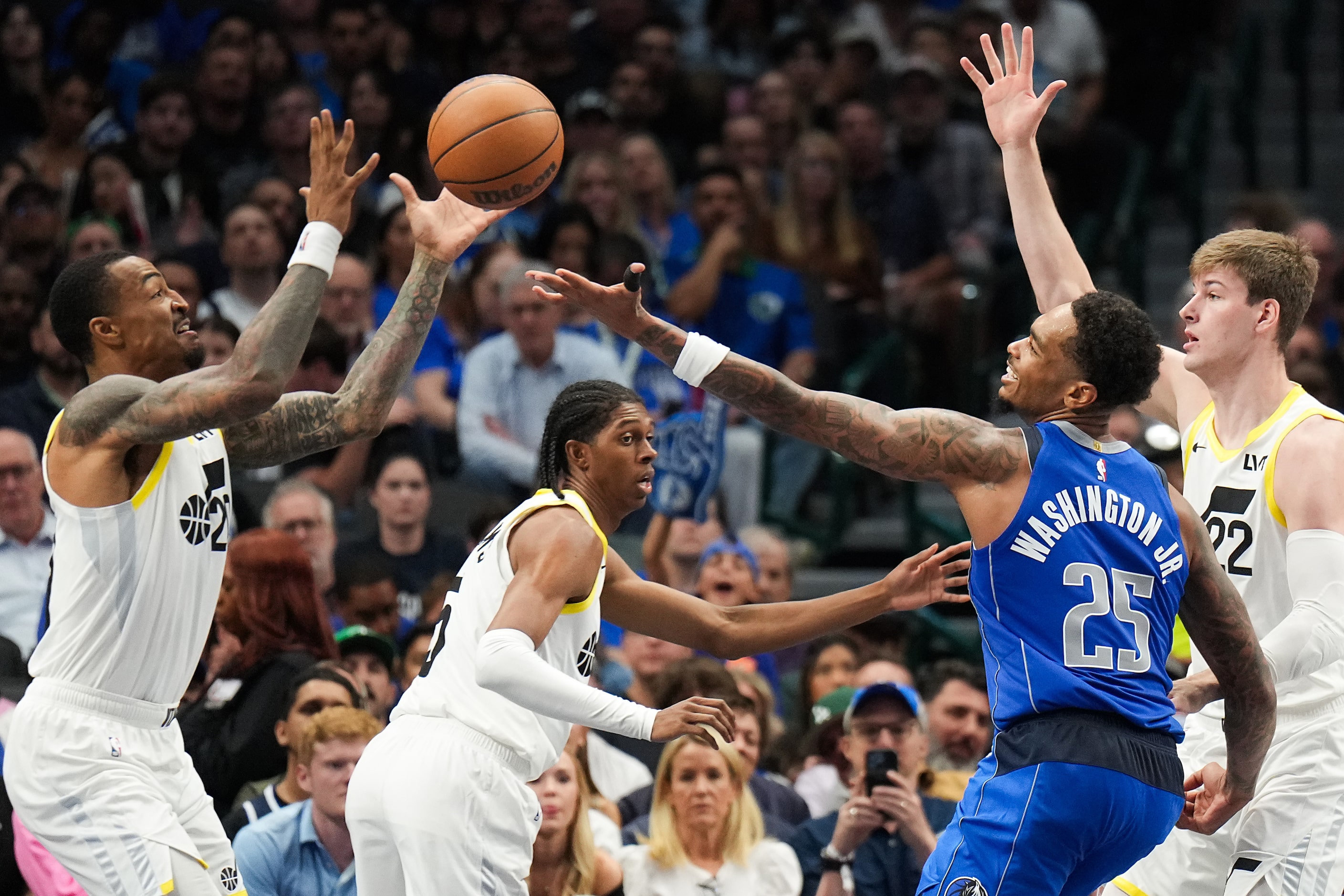 Utah Jazz forward John Collins (20) steals the ball from Dallas Mavericks forward P.J....