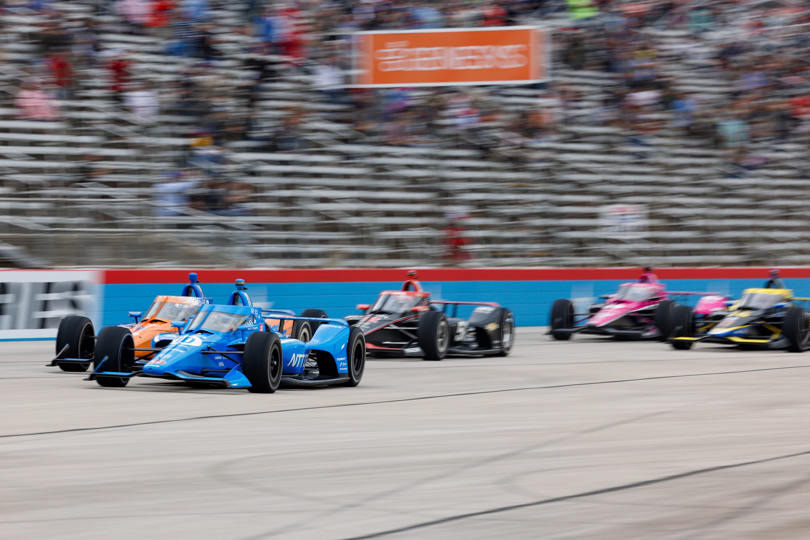 Drivers follow the pace care before the start of the IndyCar Genesys 300 race at Texas Motor...