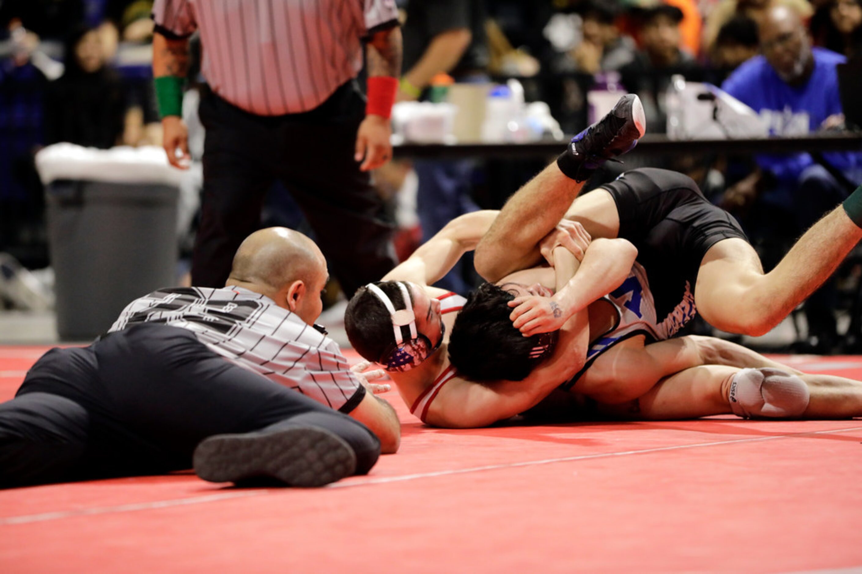 Mario Danzi of Allen wrestles during the UIL Texas State Wrestling Championships, Saturday,...