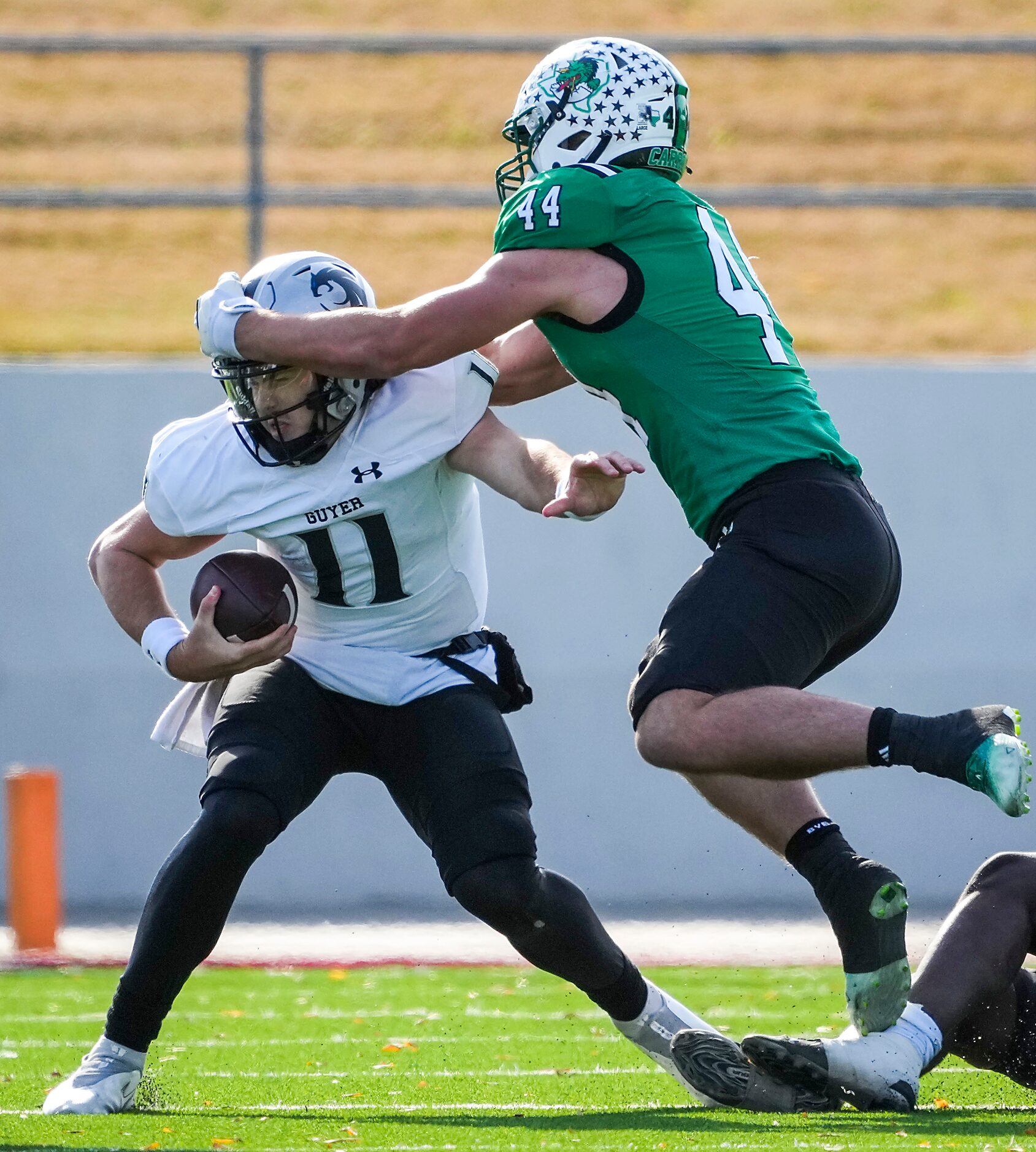 Denton Guyer quarterback Jackson Arnold (11) is sacked by Southlake Carroll defensive...