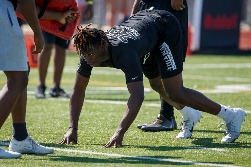 Nolan Catholic defensive lineman Nana Osafo-Mensah (269) runs a drill during The Opening...