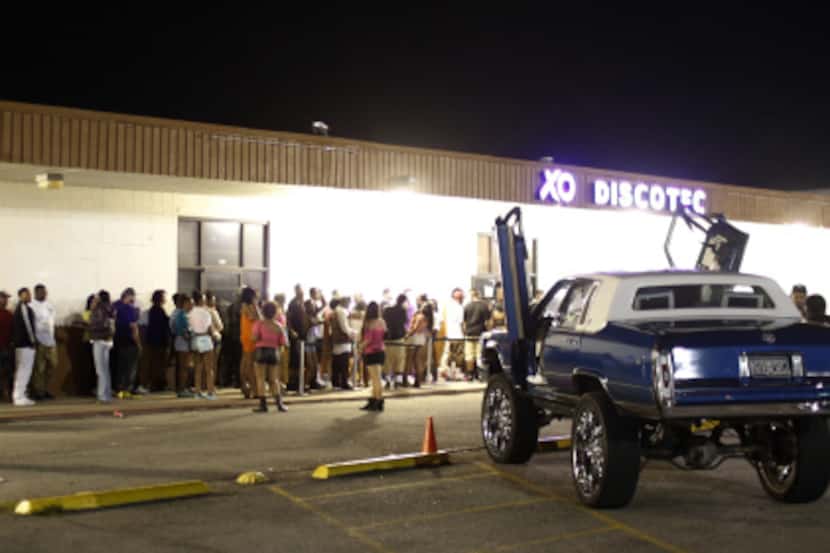 A long line formed outside XO Discotec on Friday night.