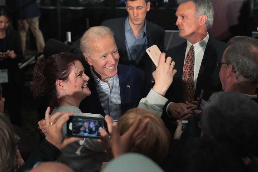 Former Vice President Joe Biden greets guests during a campaign event at the Grand River...