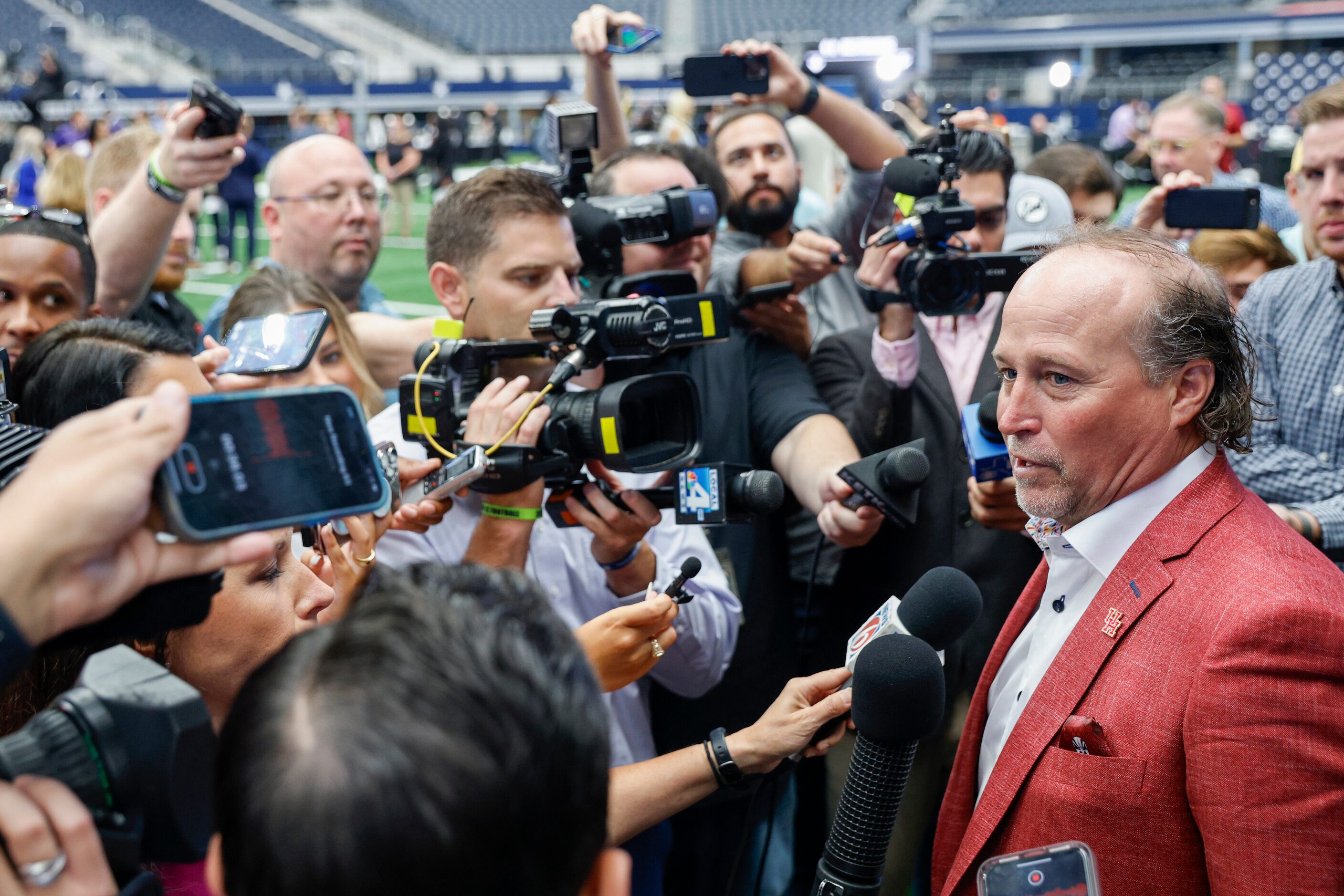 Houston head coach Dana Holgorsen speaks with reporters during the Big 12 Media Days at AT&T...