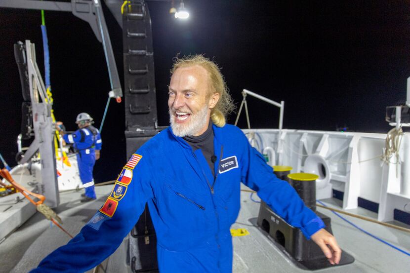 In this photo provided by Atlantic Productions for Discovery Channel, Victor Vescovo emerges...