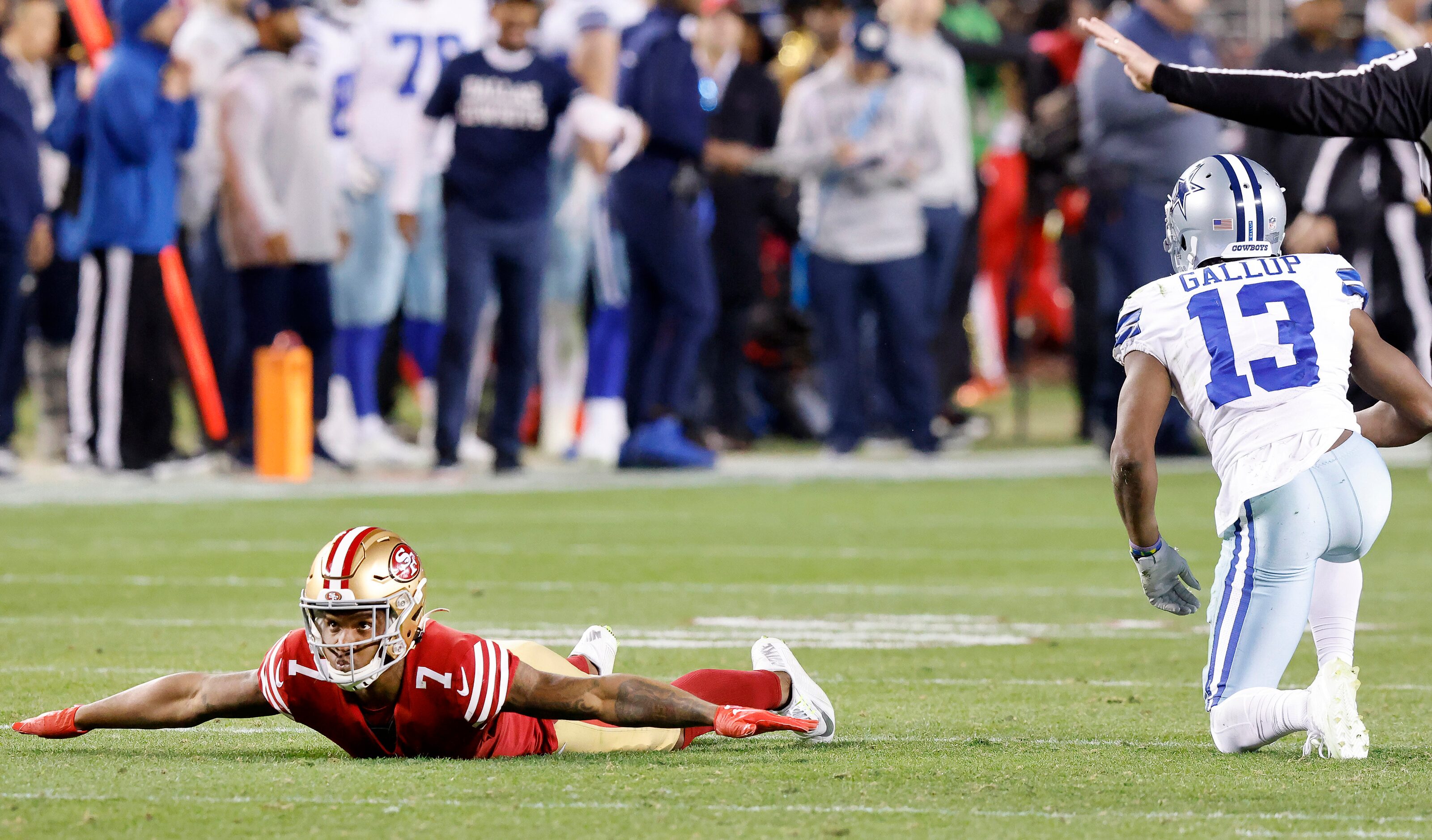 San Francisco 49ers cornerback Charvarius Ward (7) waves incomplete after he kept Dallas...