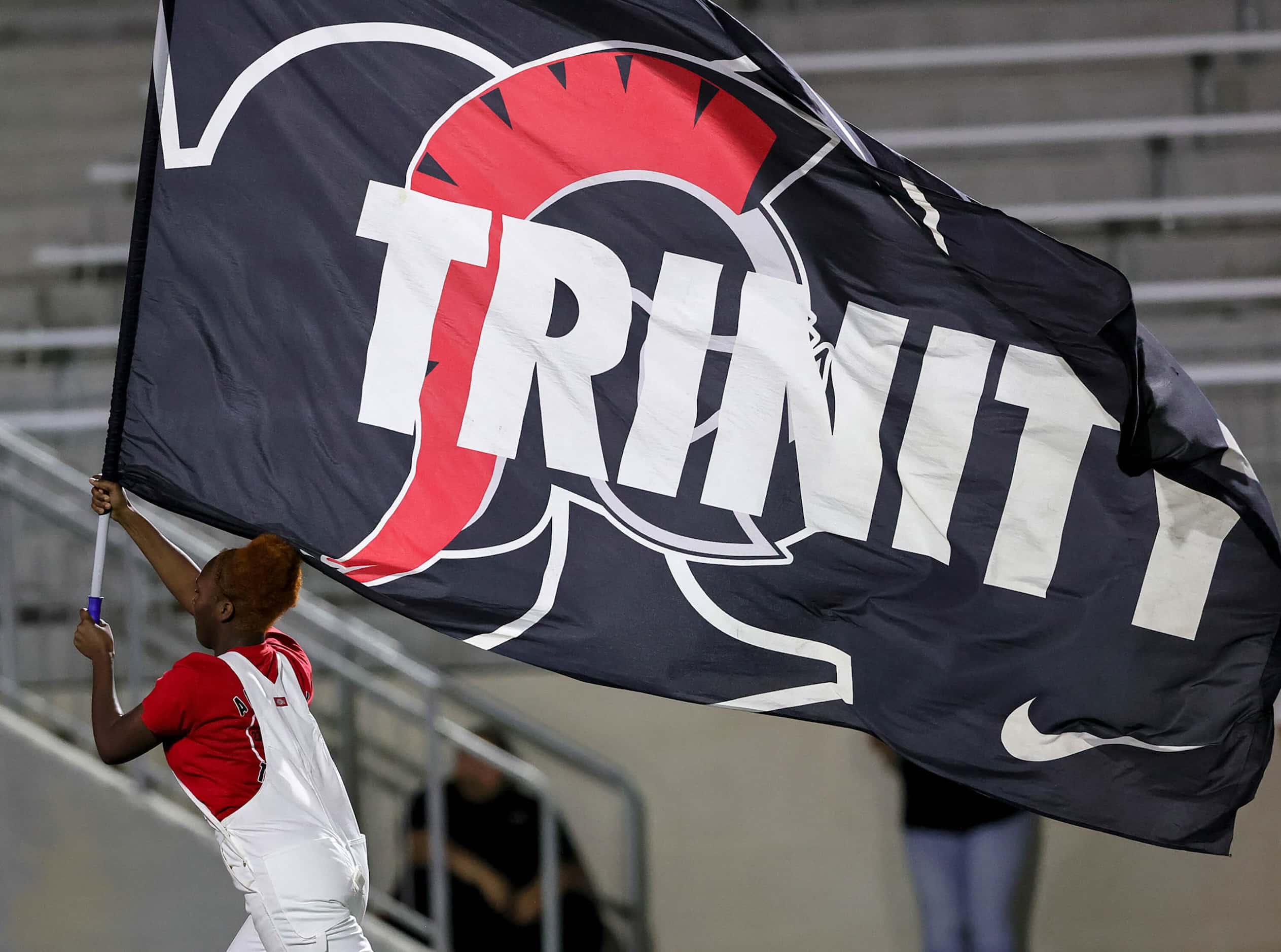 The Euless Trinity flag goes across the field after a touchdown against North Crowley during...