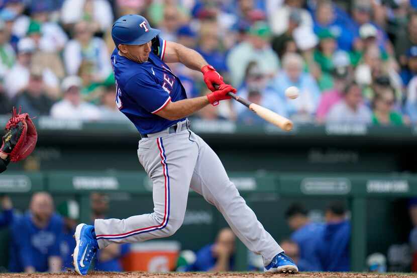 Texas Rangers' Wyatt Langford connected for a run-scoring single against the Chicago Cubs...
