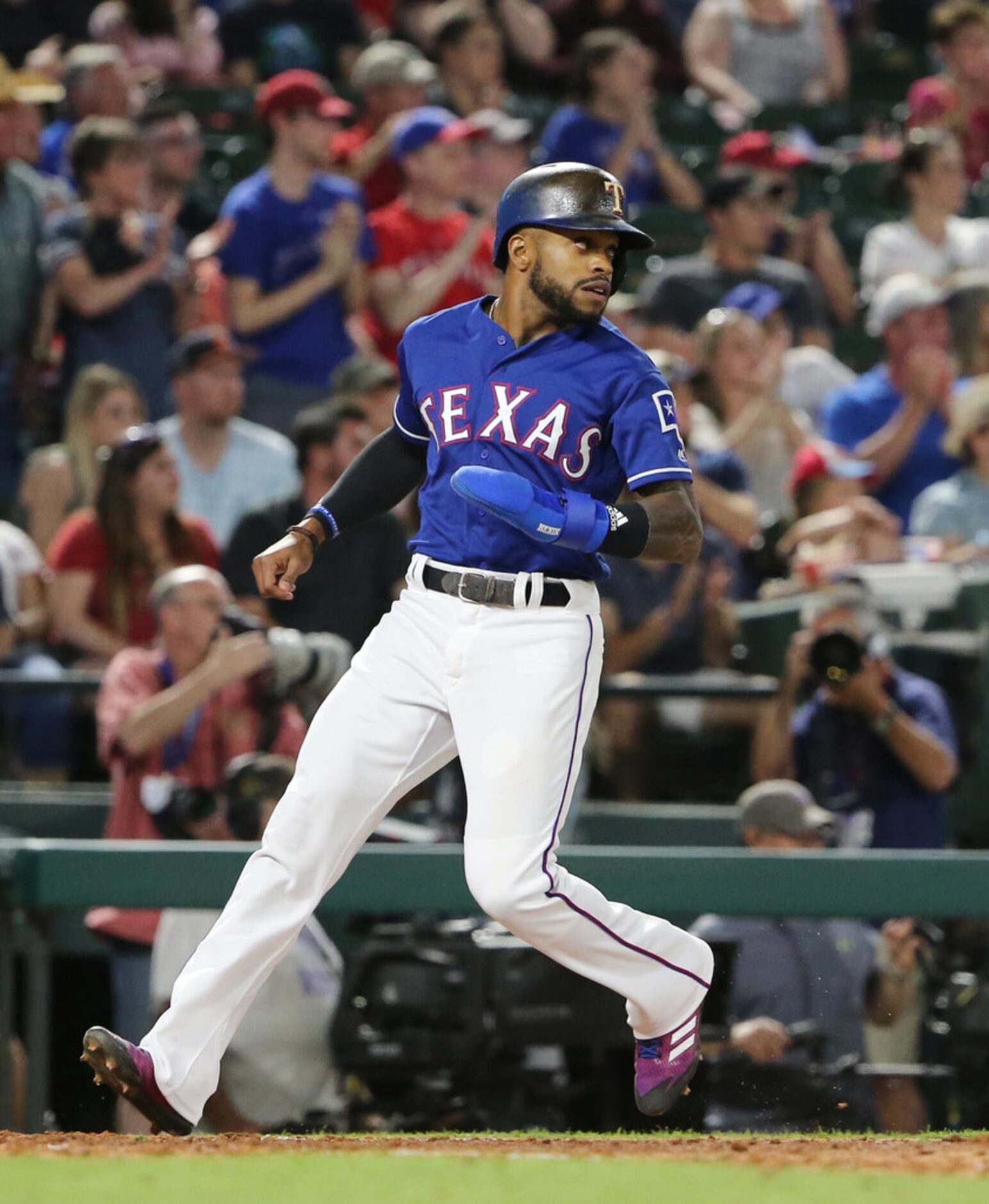 Texas Rangers third baseman Adrian Beltre (29) singles to drive in centerfielder Delino...