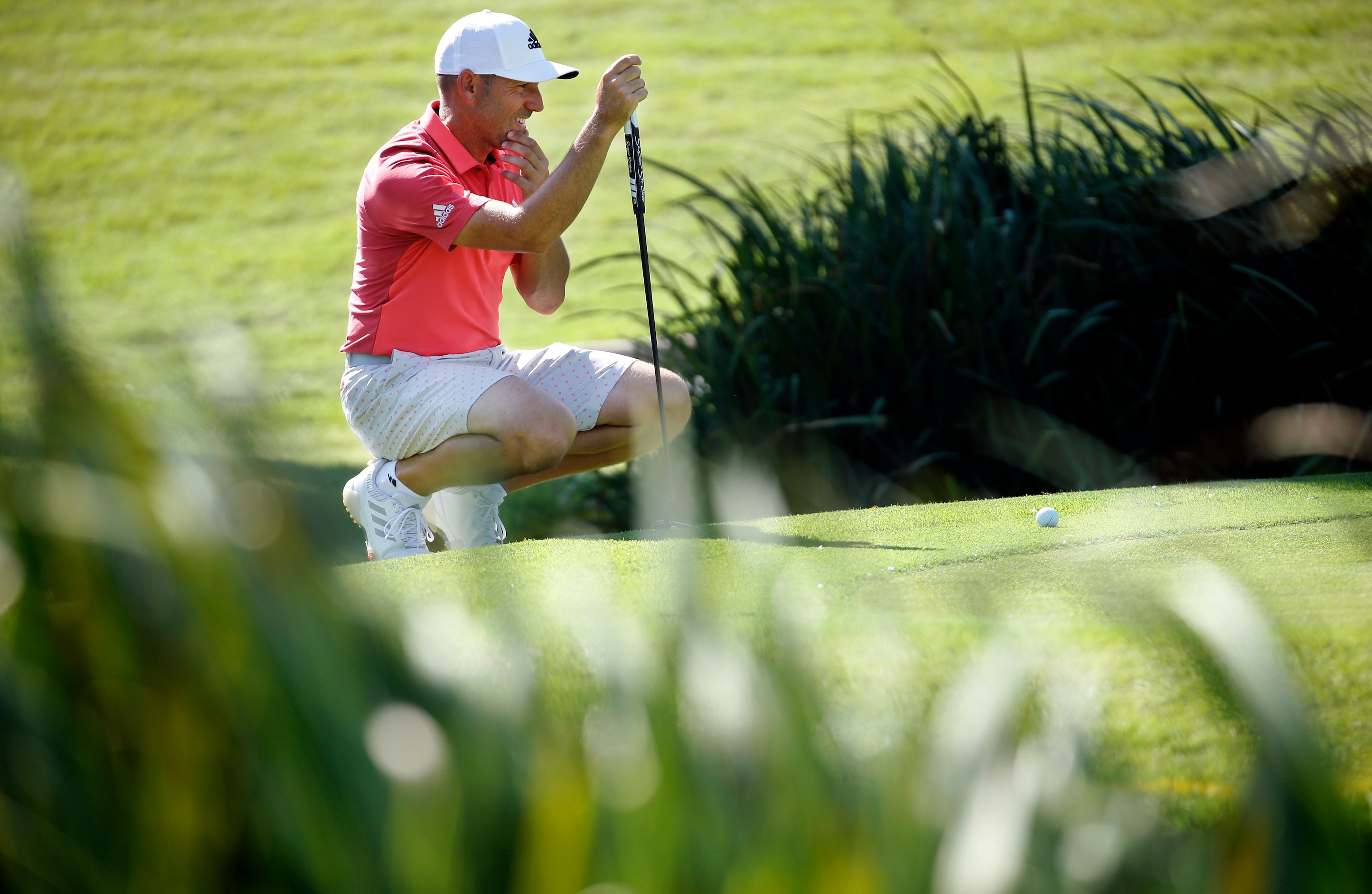 PGA golfer Sergio Garcia lines up his putt on No. 9 during the Charles Schwab Challenge...