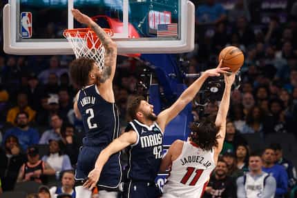 Dallas Mavericks forward Maxi Kleber (42) blocks a shot attempt by Miami Heat guard Jaime...