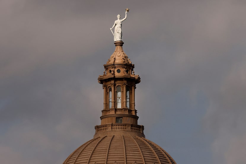 The Goddess of Liberty sits atop the Texas State Capitol dome in Austin, Texas, Thursday,...