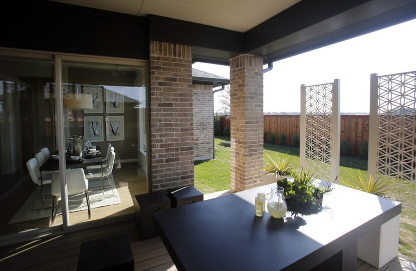 Outdoor eating area in the MainVue Homes Carmel Q1 model home at Phillips Creek Ranch in...