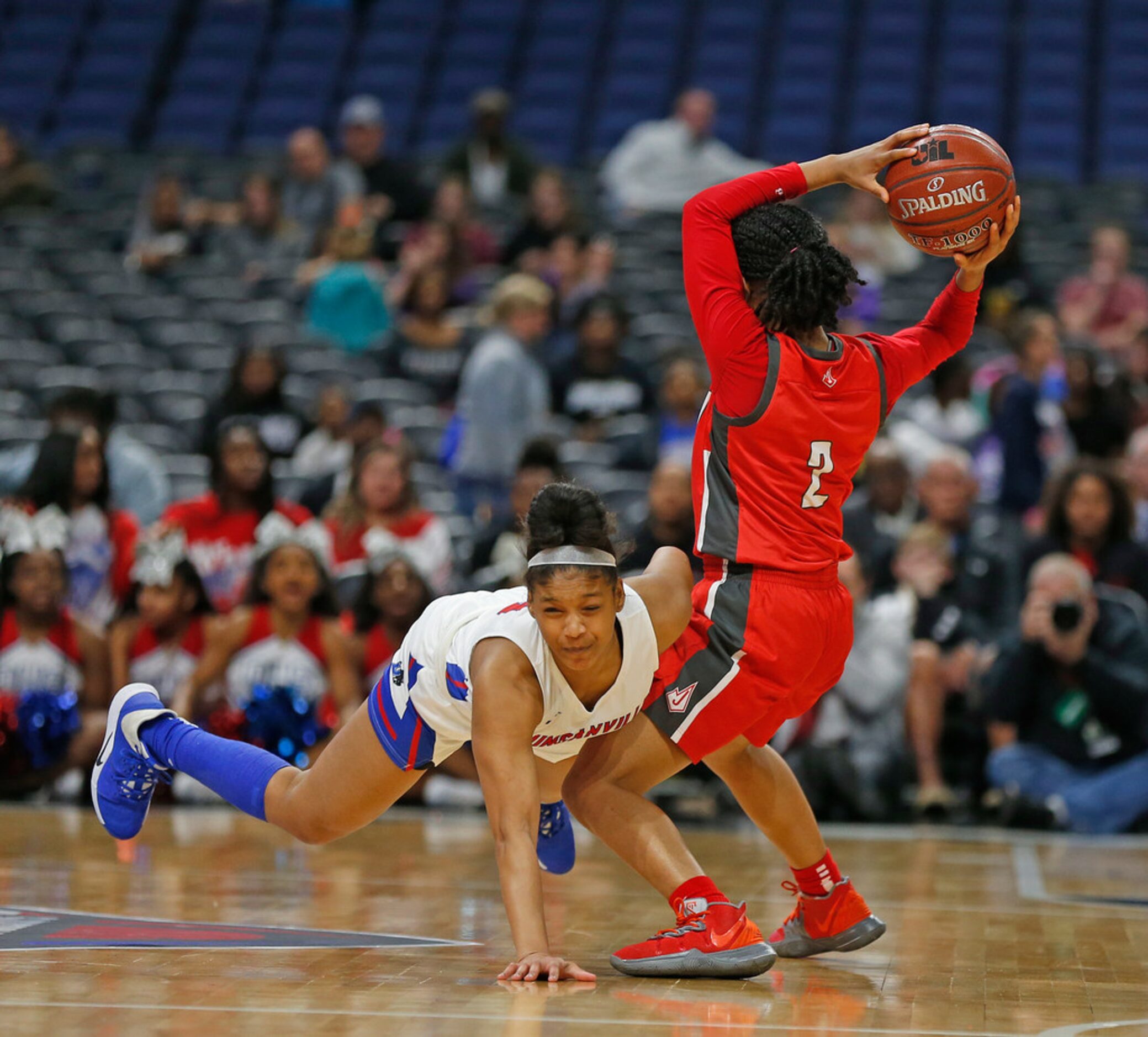 Duncanville guard Kiyara Howard-Garza #14 tries to steal the ball from Judson guard Teanna...