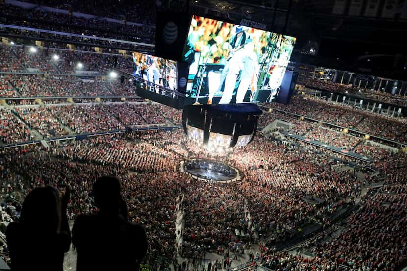 Fans watched the closing numbers as George Strait plays the last show of his final tour at...