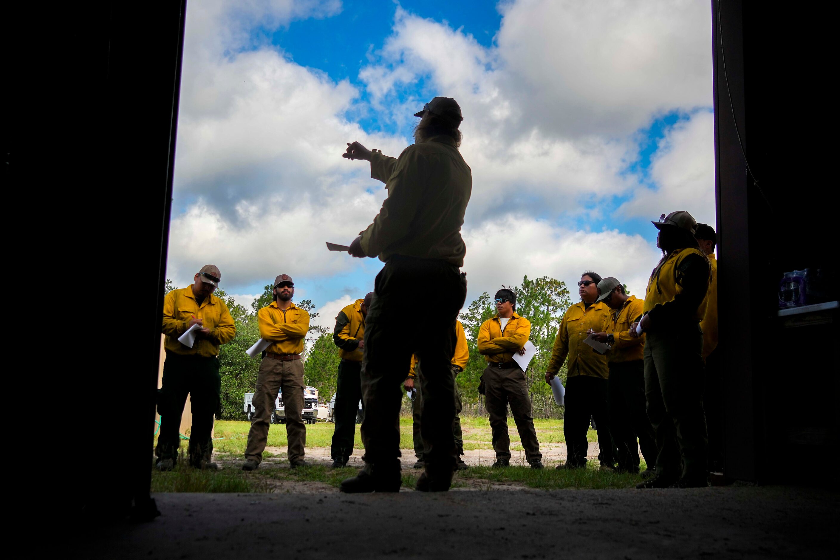 Shawn Benedict, East Texas Forest Preserves Manager for The Nature Conservancy, briefs the...