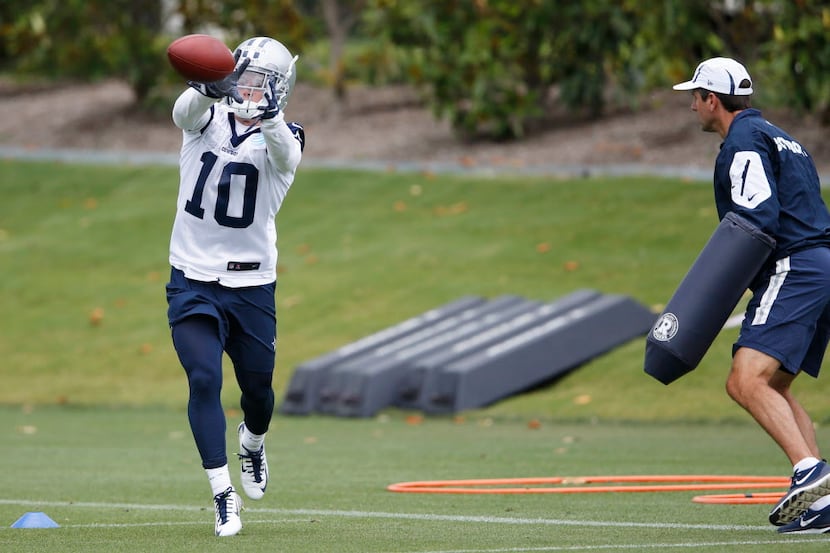 Dallas Cowboys wide receiver Ryan Switzer (10) catches a pass in a drill as wide receivers...