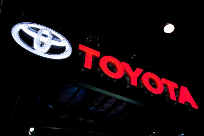 FILE - In this Feb. 7, 2018, file photo the logo of Toyota is displayed at the Auto Expo in...