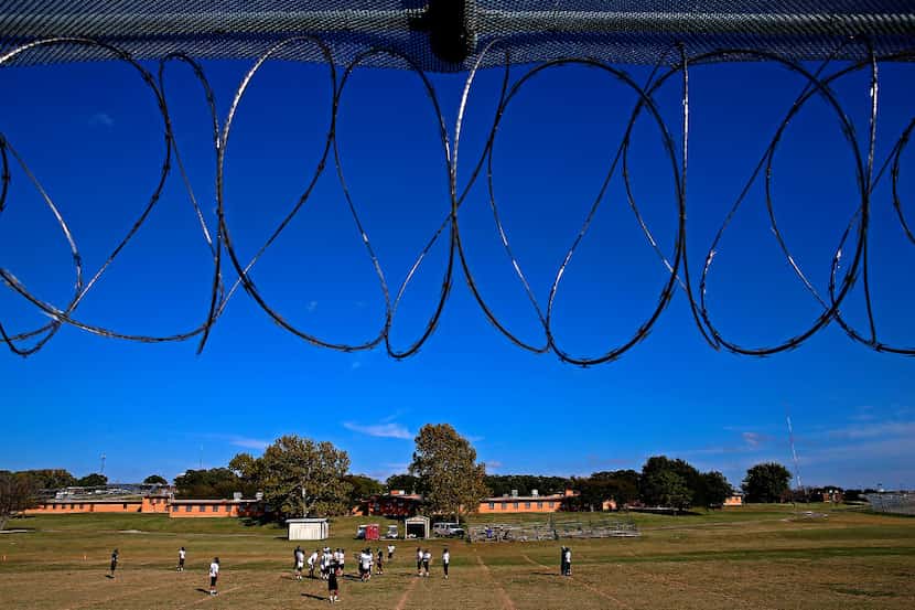 Gainesville State football players practice at Gainesville State School for juvenile...