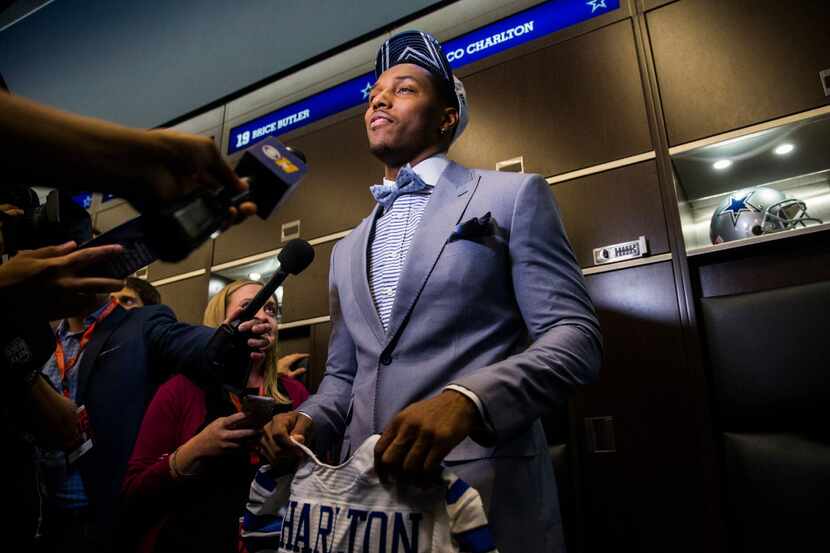 The Dallas Cowboys first round draft pick, defensive end Taco Charlton, answers questions...