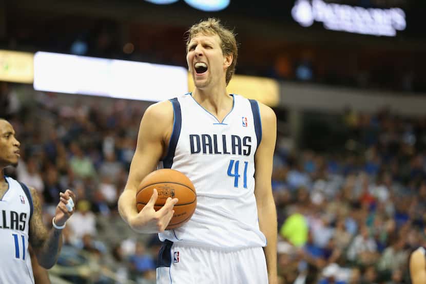 DALLAS, TX - OCTOBER 30:  Dirk Nowitzki #41 of the Dallas Mavericks reacts during play...