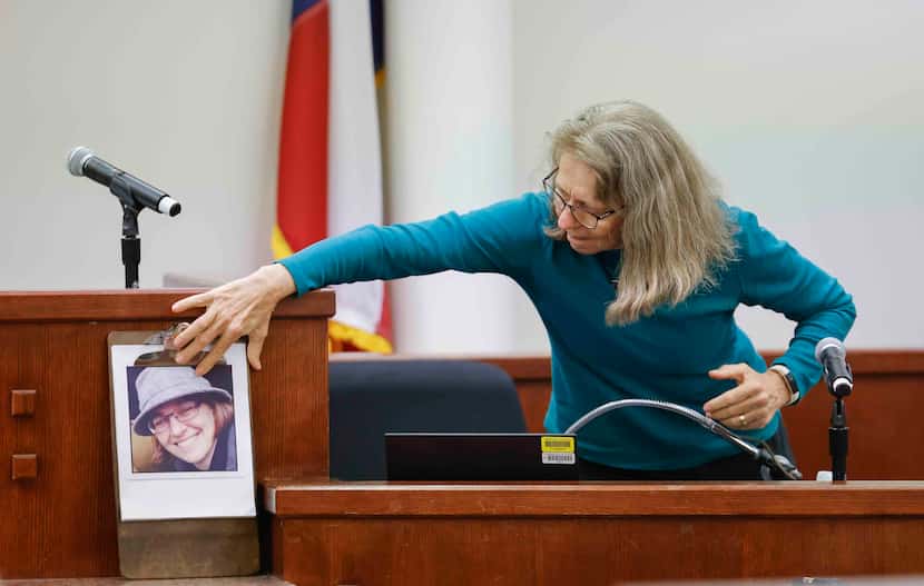 Diane Getrum touches a portrait of her slain daughter, Megan Getrum, who was murdered by...