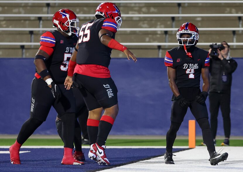 Duncanville wide receiver Ayson Theus (4) celebrates his touchdown reception against...