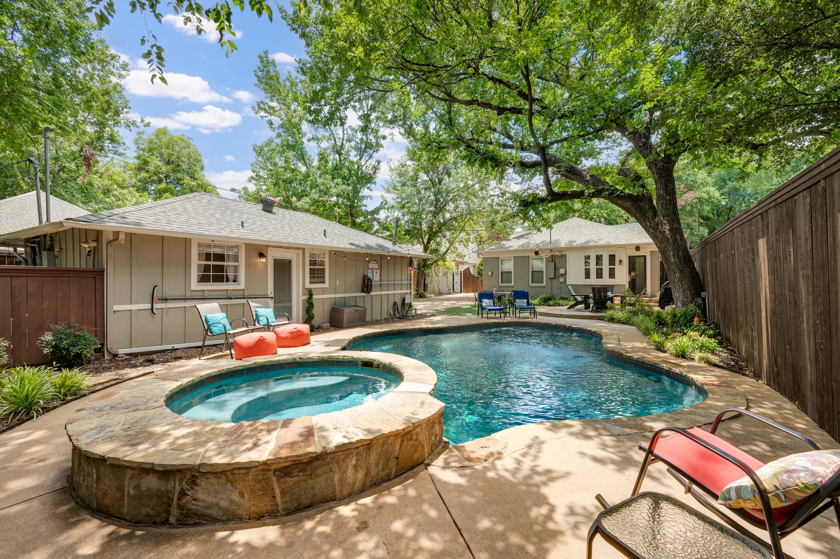 The shaded backyard pool is an ideal place to spend a late-summer day.