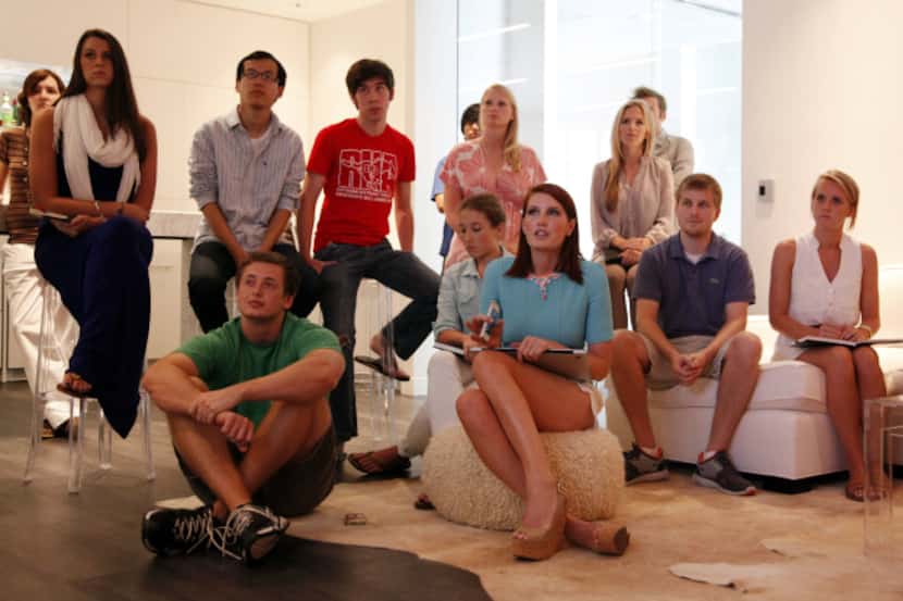 Amber Venz (in front in blue), president and co-founder of fashion tech startup ...