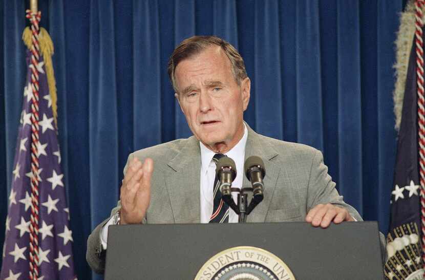 In this file photo from Aug. 27, 1992, a year after the first Gulf War, U.S. President...