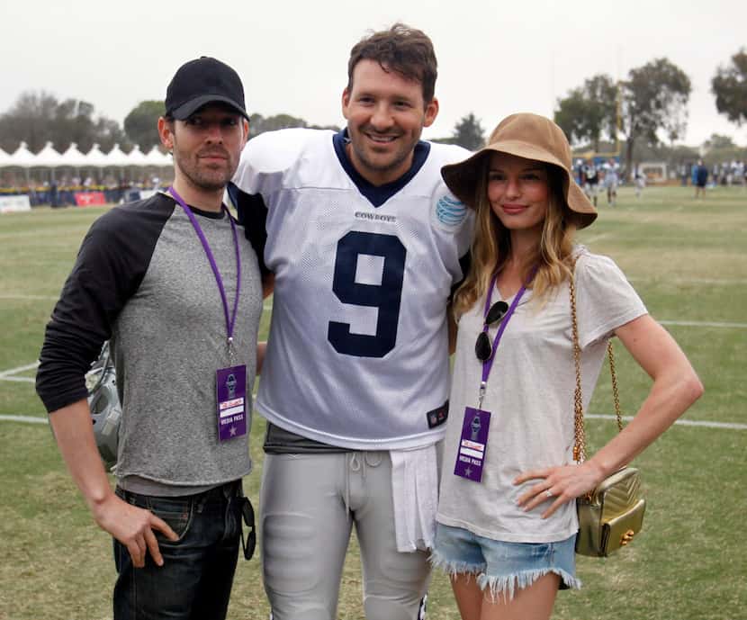 Michael Polish, Cowboys quarterback Tony Romo (9) and actress Kate Bosworth pose for photos...