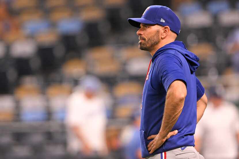 Texas Rangers manager Chris Woodward was fired Monday in the midst of his fourth season with...