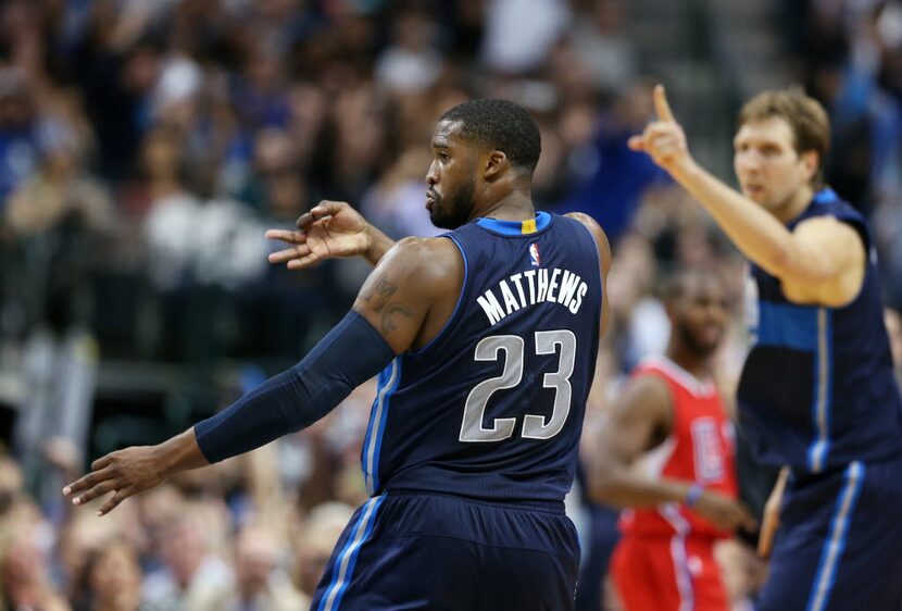 Dallas Mavericks guard Wesley Matthews (23) celebrates after making a three pointer during...