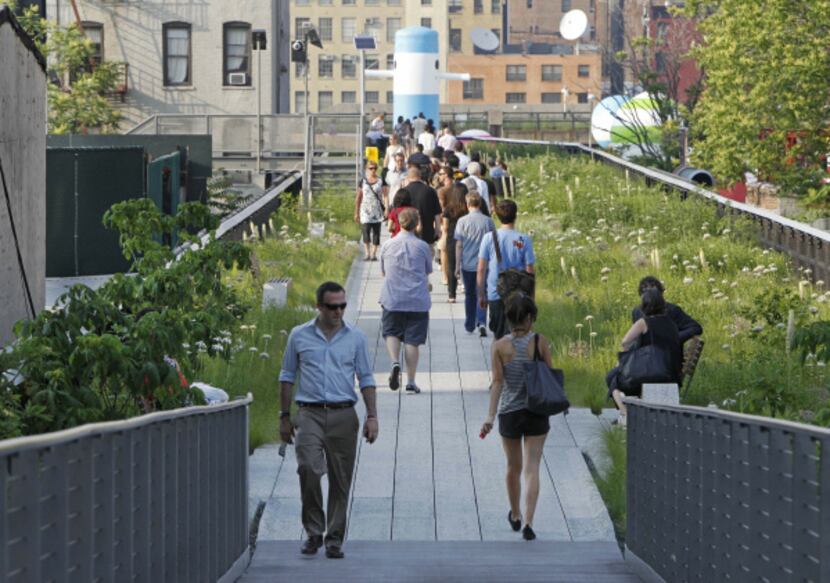 The High Line, an industrial era elevated railway converted into a city park, is built on an...