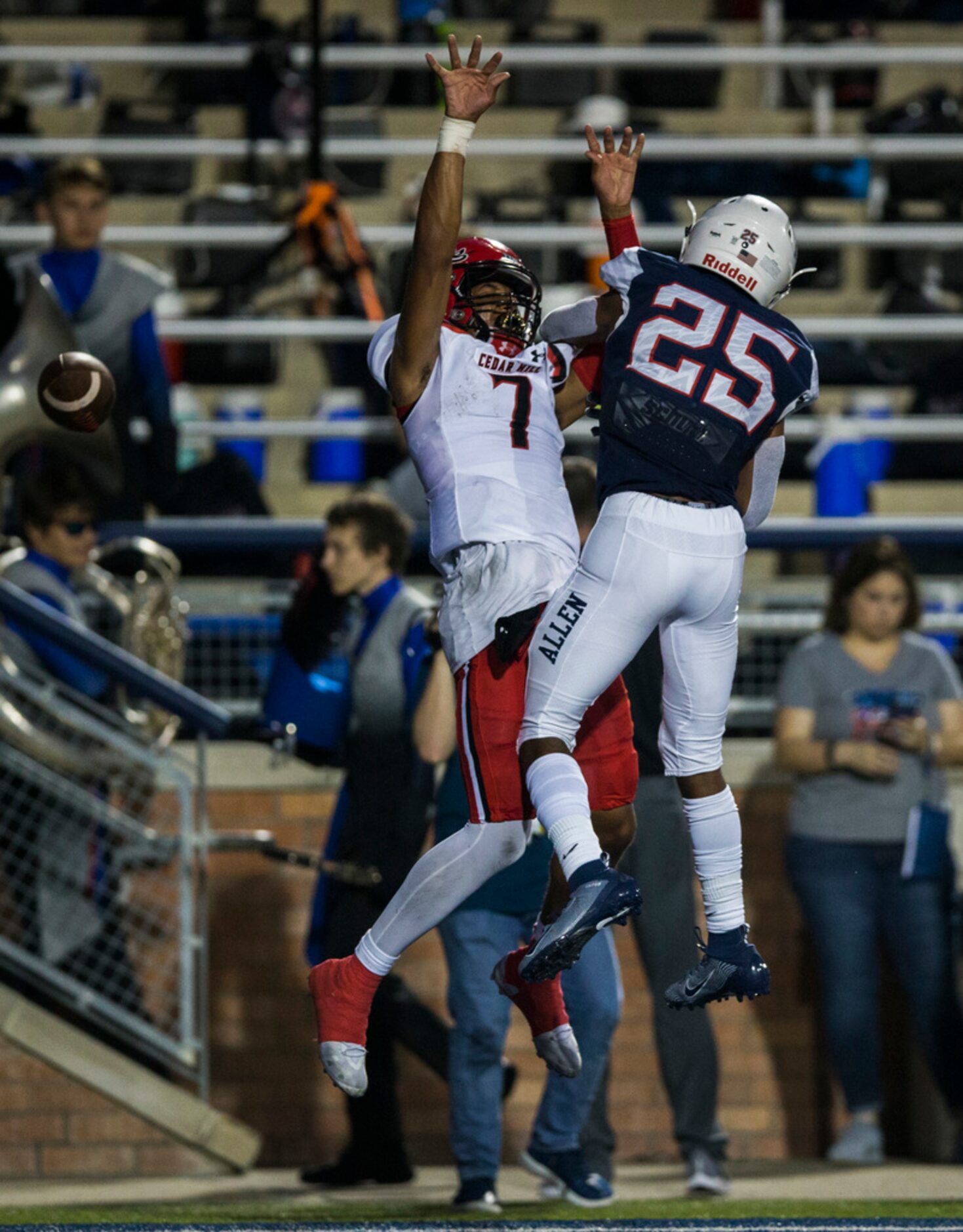 Allen defensive back Savion Richardson (25) breaks up a pass intended for Cedar Hill...