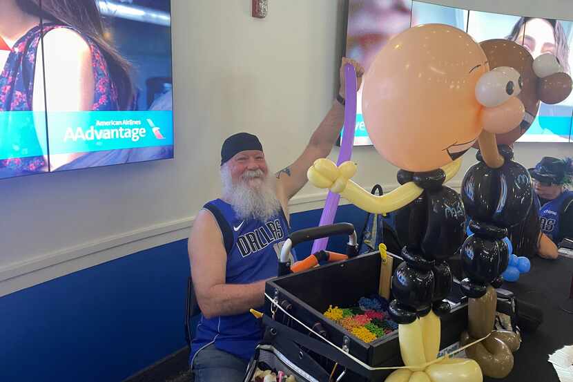 Wendell Clendennen makes balloon animals that show of his love for basketball and the Dallas...
