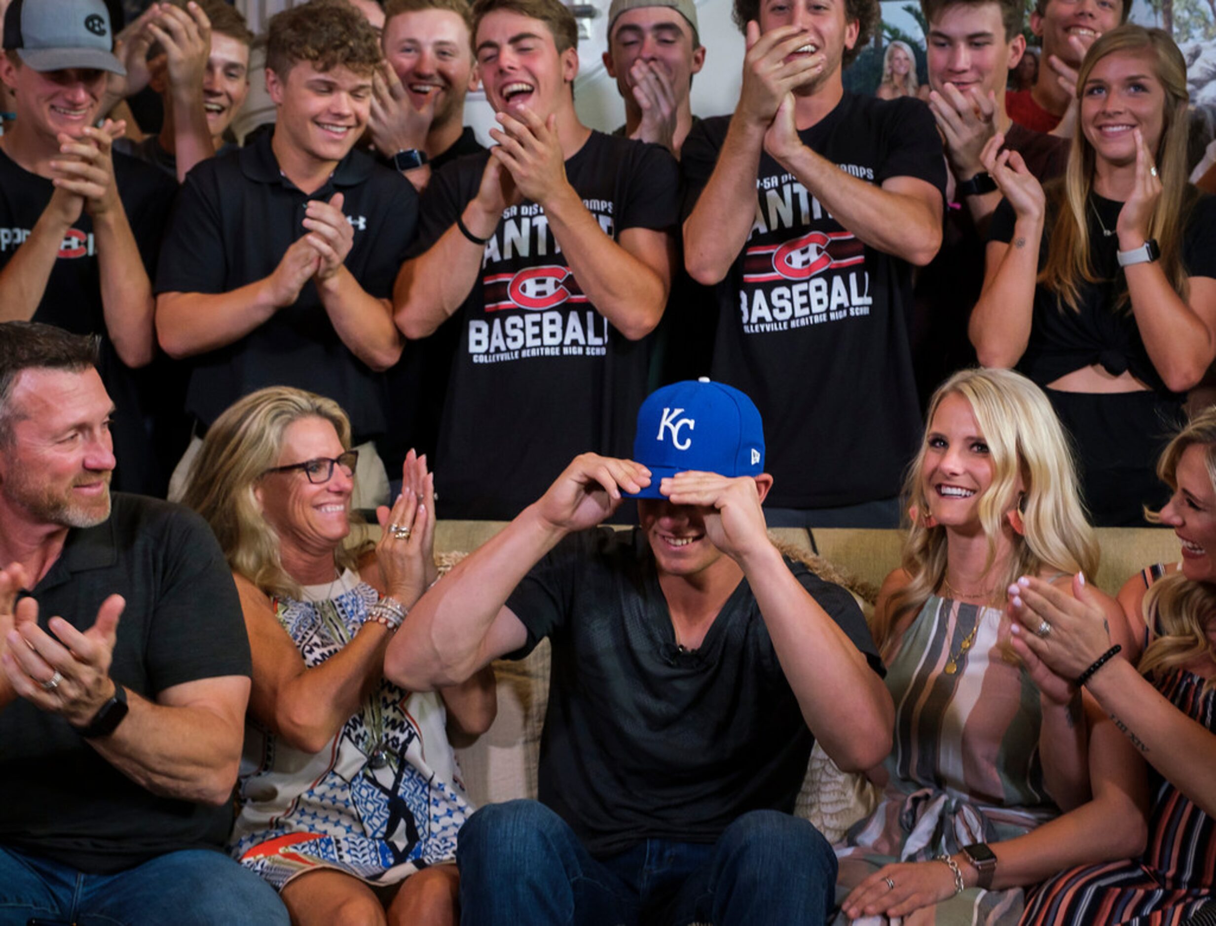 Bobby Witt Jr. dons a Kansas City Royals cap  during a Major League Baseball draft night...