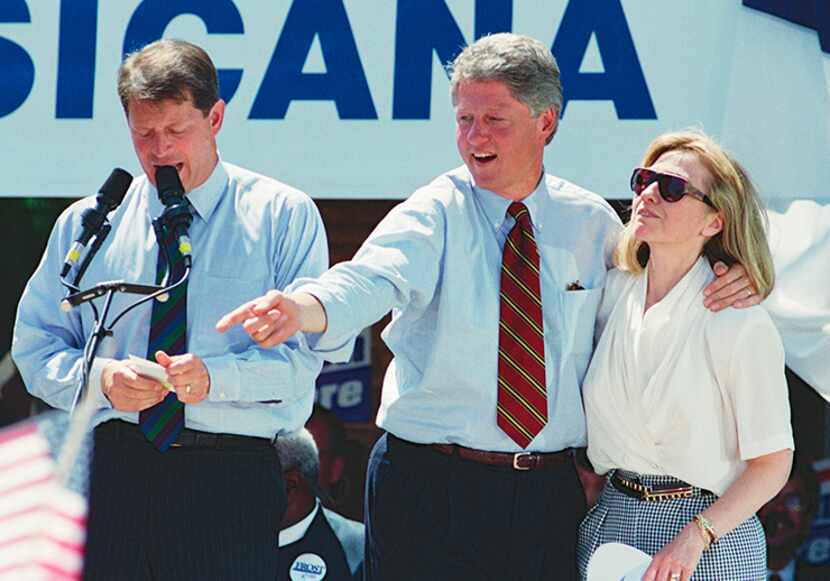  Democratic presidential candidate Bill Clinton, center, with Hillary during a campaign stop...
