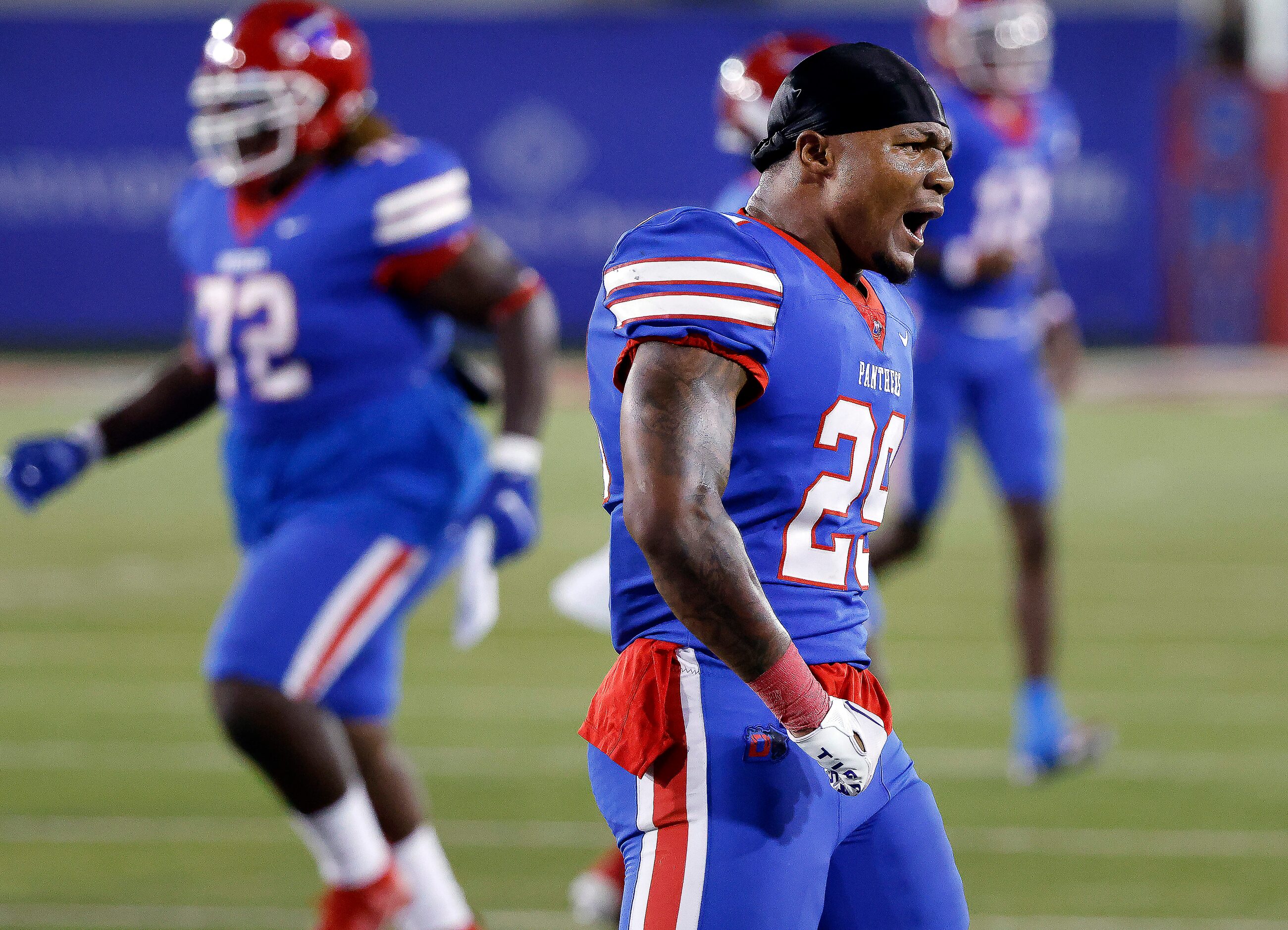 Duncanville running back Caden Durham (29) celebrates his first quarter touchdown against...