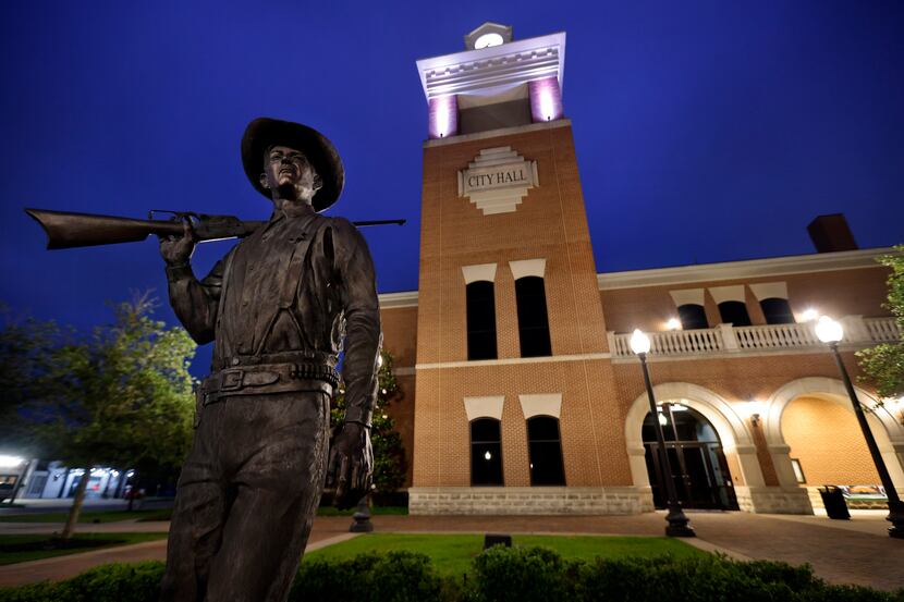A statue of early 1900's Navasota City Marshal Frank Augustus Hamner stands outside the...