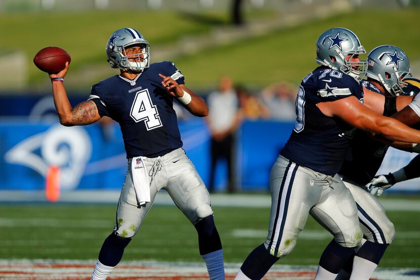 Dallas Cowboys quarterback Dak Prescott (4) throws a strike to wide receiver Terrance...