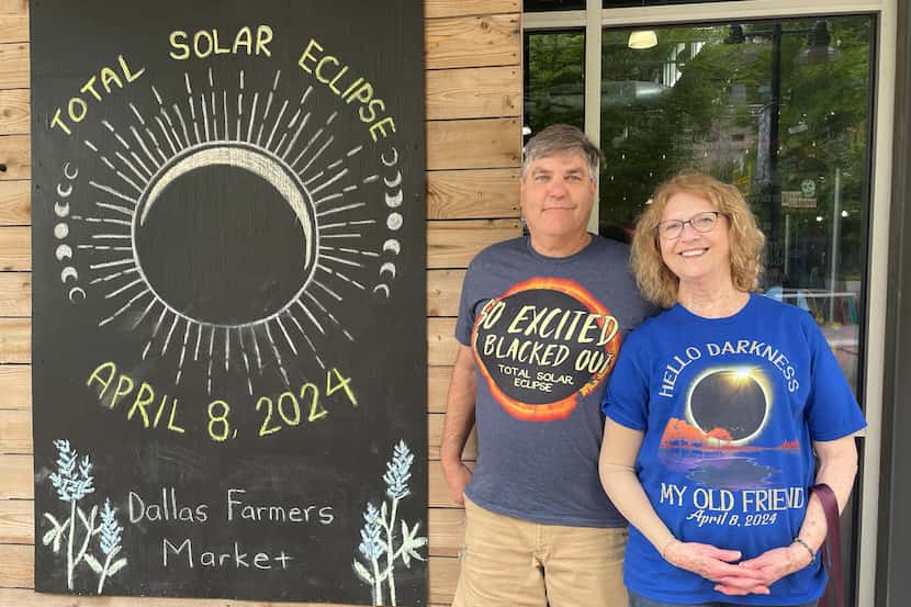 Russ and Becky Lantz, of Topeka, Kan., pose for a portrait at the farmer’s market on eclipse...