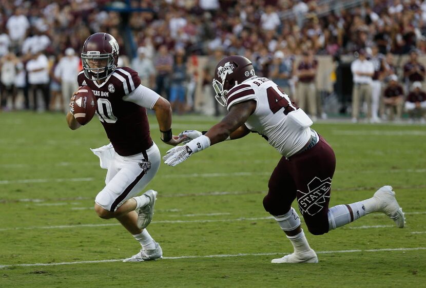 Texas A&M quarterback Kyle Allen (10) scrambles out of he pocket as Mississippi State...