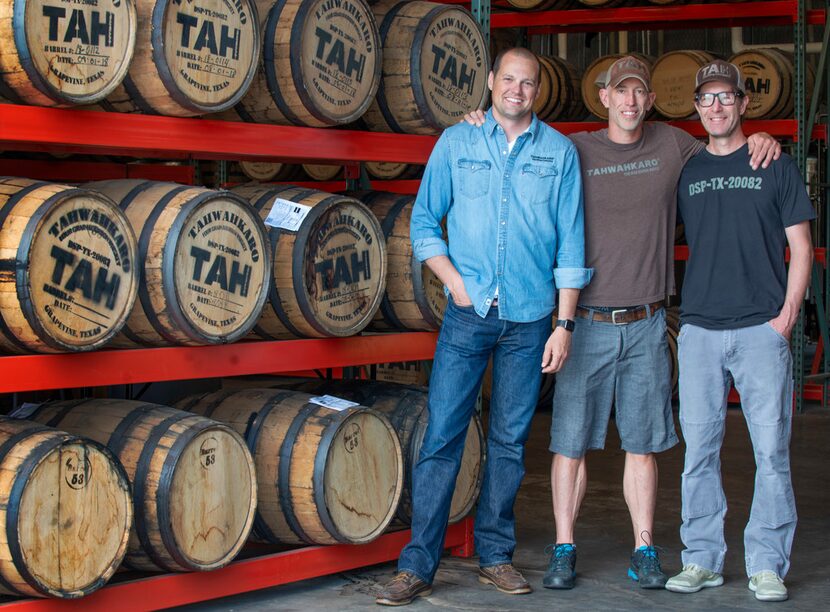 Chris Vivion, left, Jason Jackson and brother Justin Jackson, owners of Tahwahkaro craft...