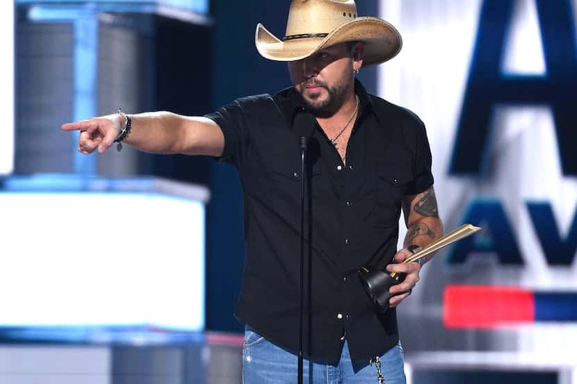 Jason Aldean accepts the Dick Clark artist of the decade award at the 54th annual Academy of...
