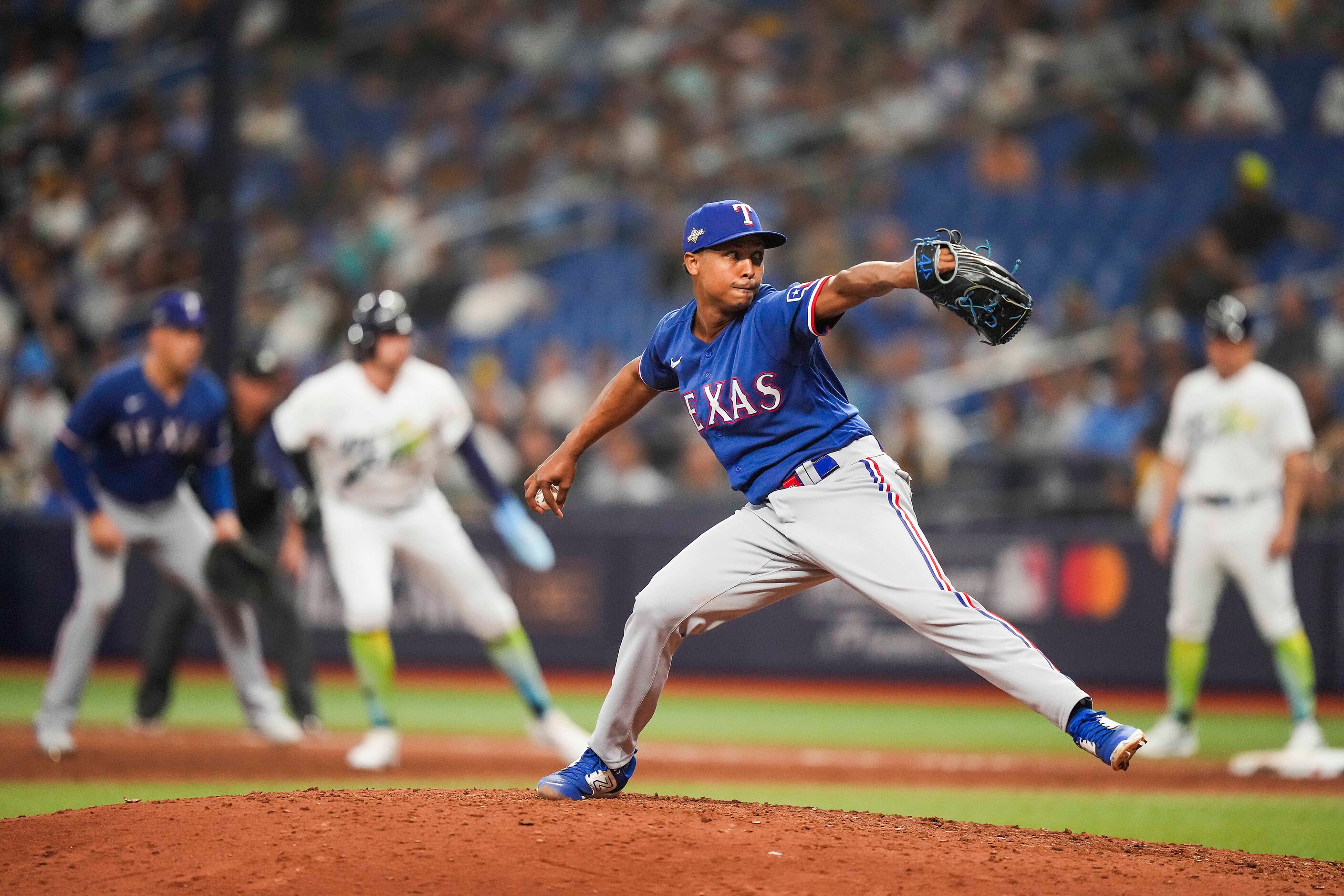 Texas Rangers relief pitcher Jose Leclerc delivers during the ninth inning of an American...