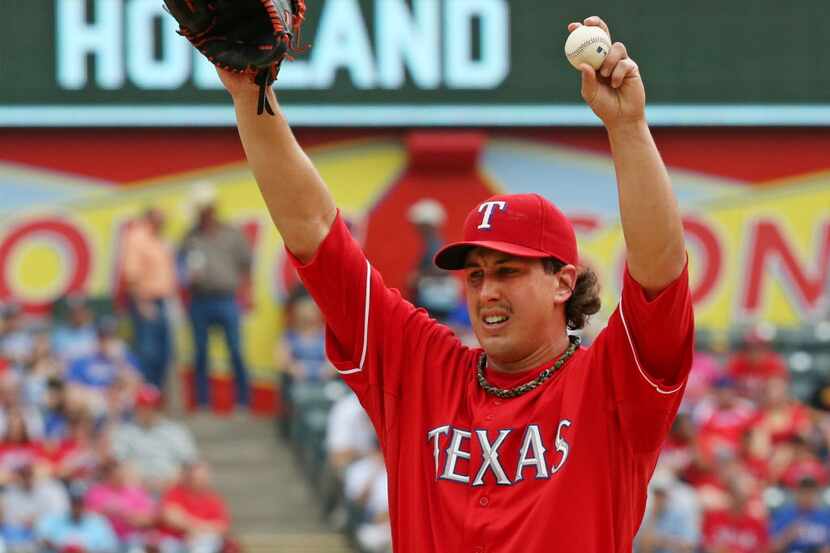 Texas starting pitcher Derek Holland is pictured during the Los Angeles Angels vs. the Texas...