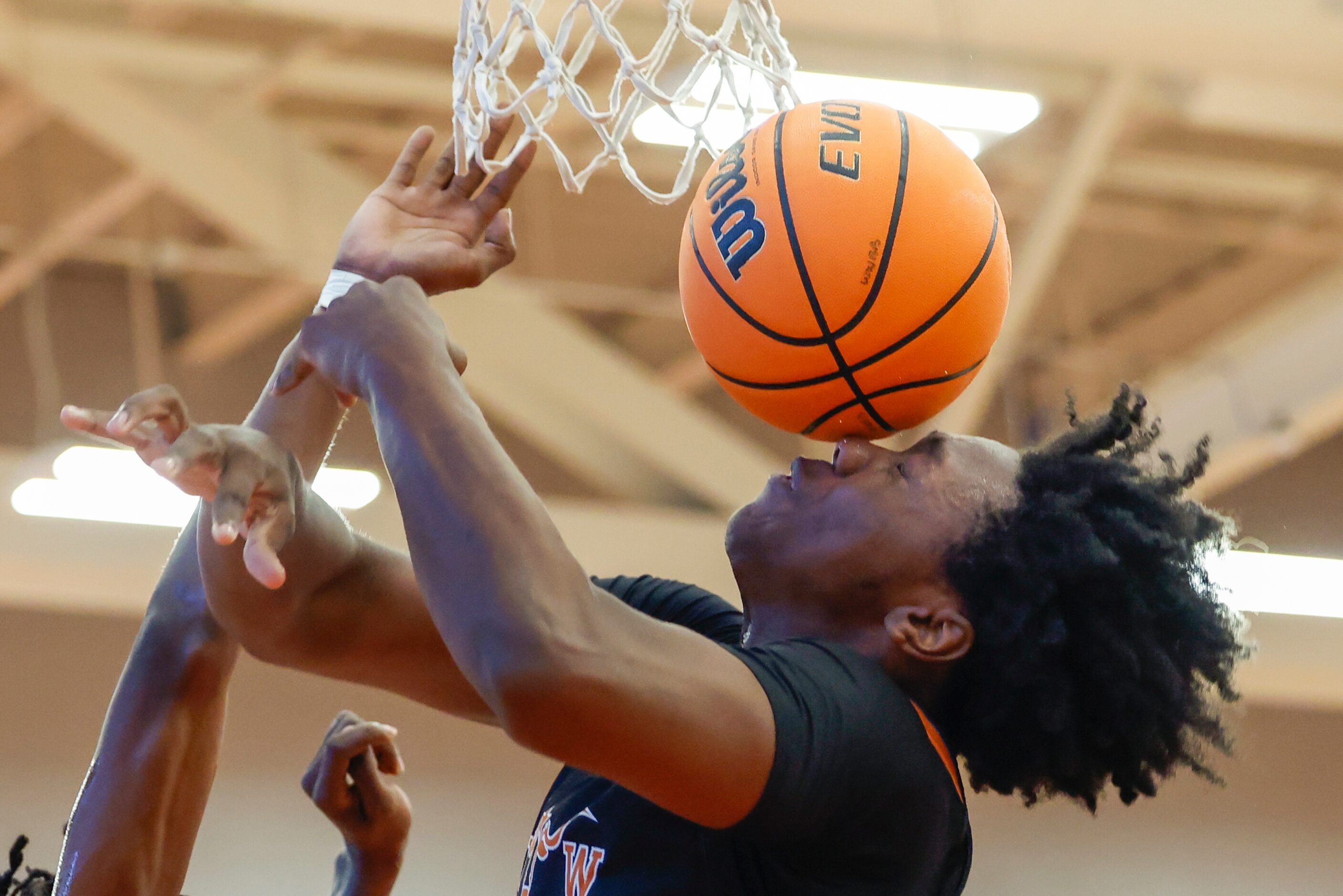 W.T. White forward Dre Cole (0) loses the ball after being fouled during the second quarter...